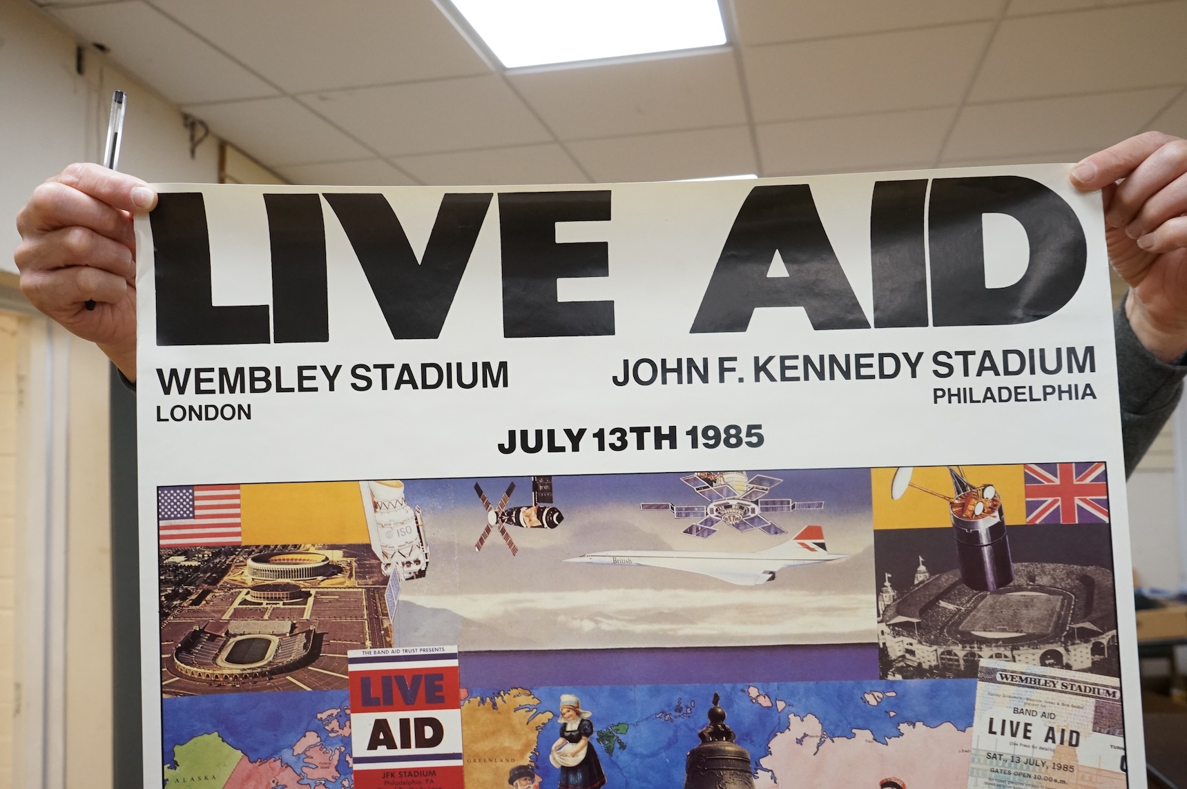 An original Live Aid poster, dated July 13th, 1985, and promoting the concerts at Wembley Stadium London, and John F. Kennedy Stadium Philadelphia, designed by Peter Blake, with photography by David Bailey and printed in